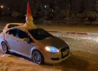 Otomobil Tavanında Kardan Adamla Şehir Turu Atan Adam otomobil-tavannda-kardan-adamla-ehir-turu-atan-adam